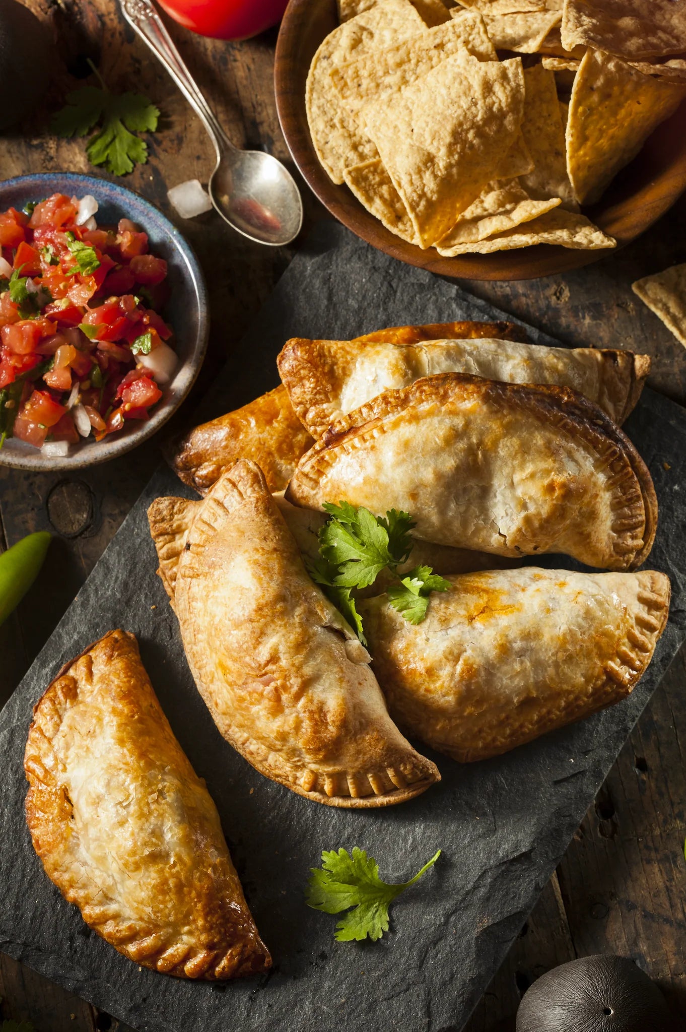 Crawfish hand pies with pico de gallo and chips