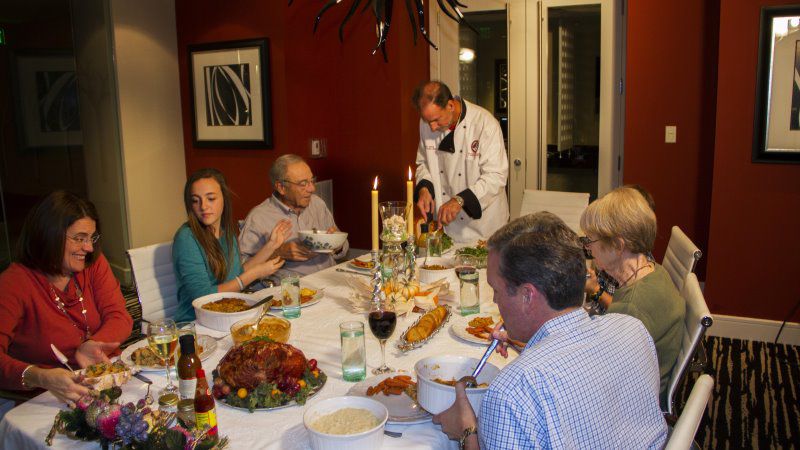 The Howell family gathered around the table