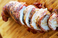 Pork Tenderloin Stuffed with Shrimp, Andouille Sausage, & Pepper Jack Cheese then wrapped in Bacon