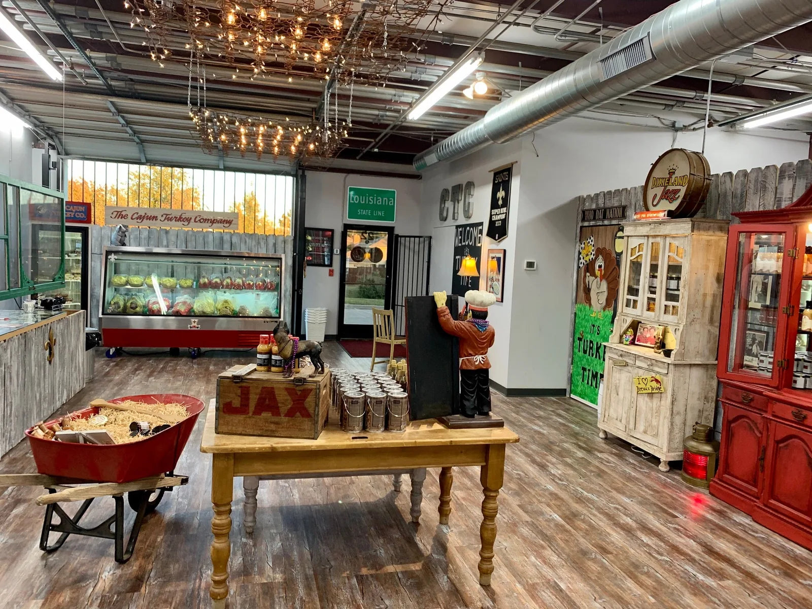 Wide interior of the store with Cajun decor and seasonings