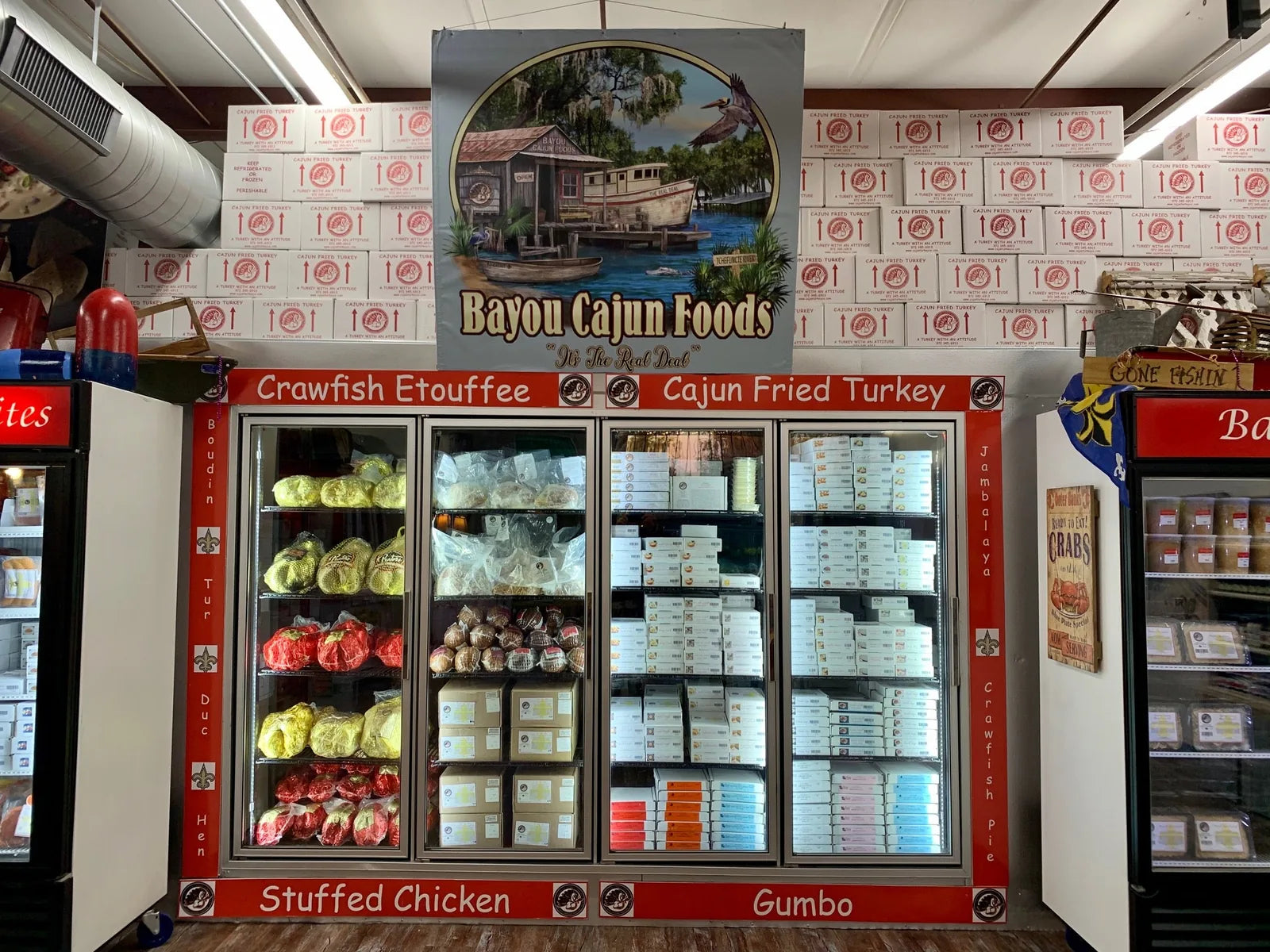 Bayou Cajun Foods deli case with crawfish etouffee and gumbo