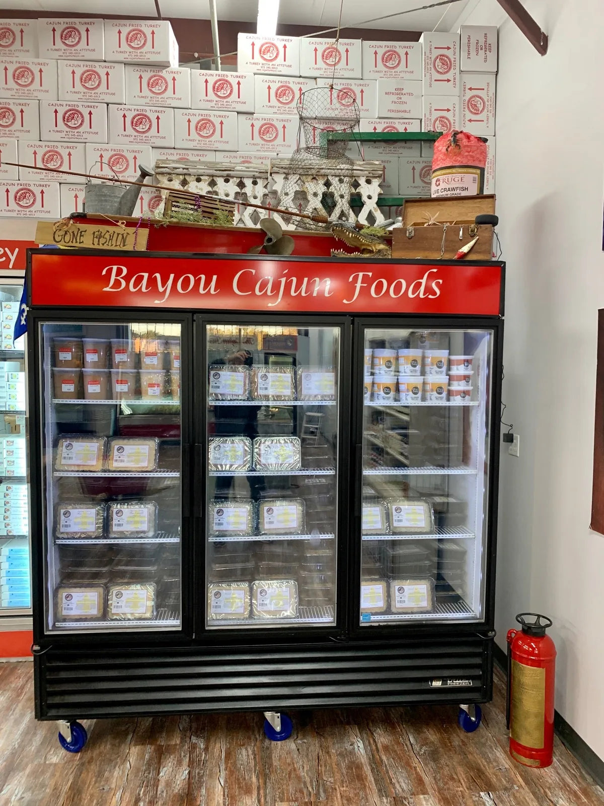 Bayou Cajun Foods freezer stocked with boxed orders