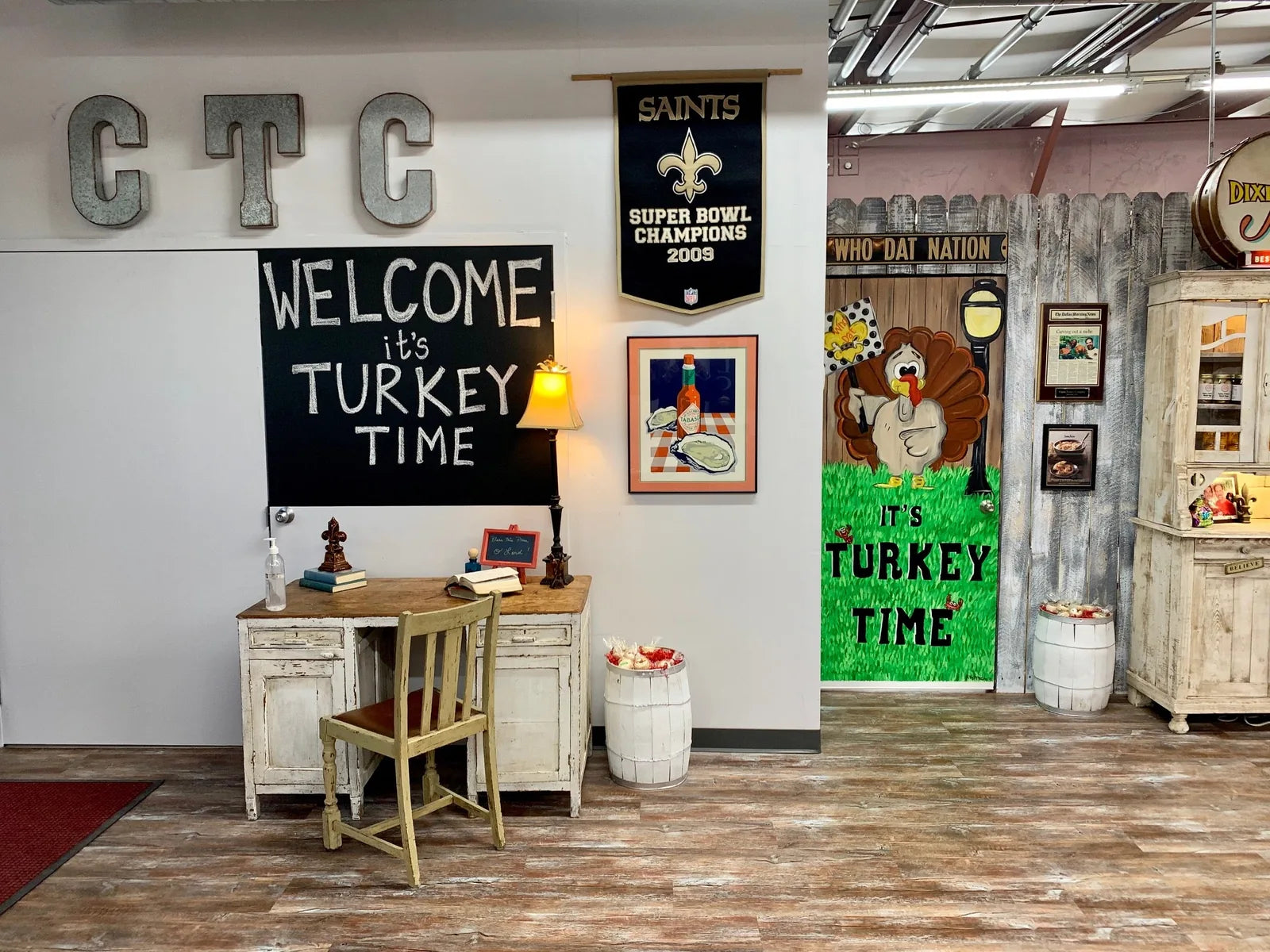 CTC sign with New Orleans Saints banner and Turkey Time decor